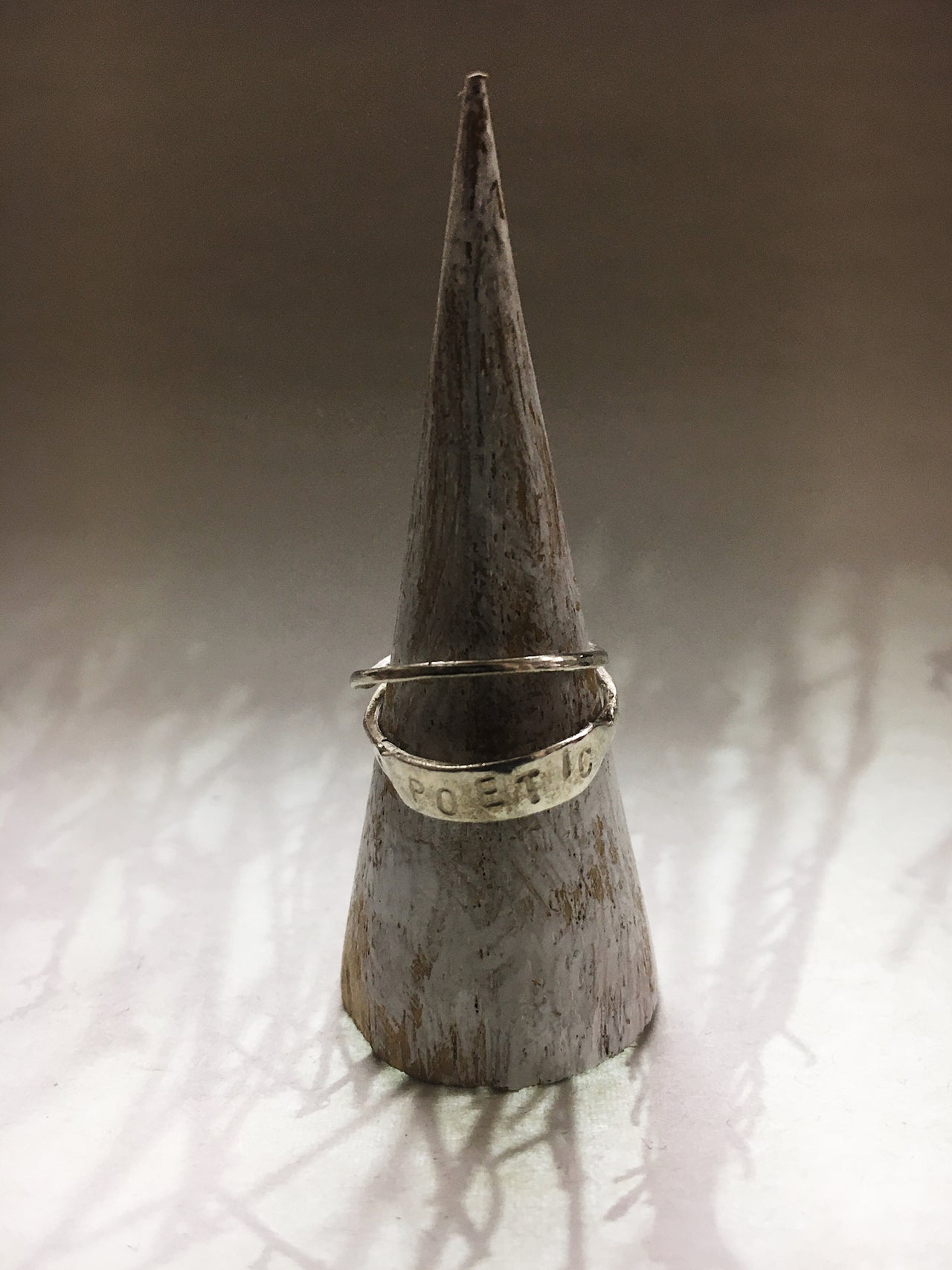 Poetic doubleband ring