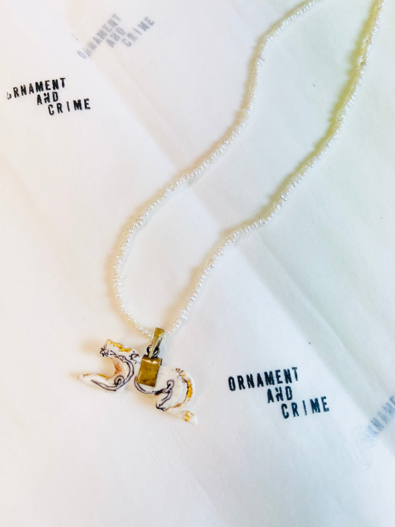 Snake on horse necklace