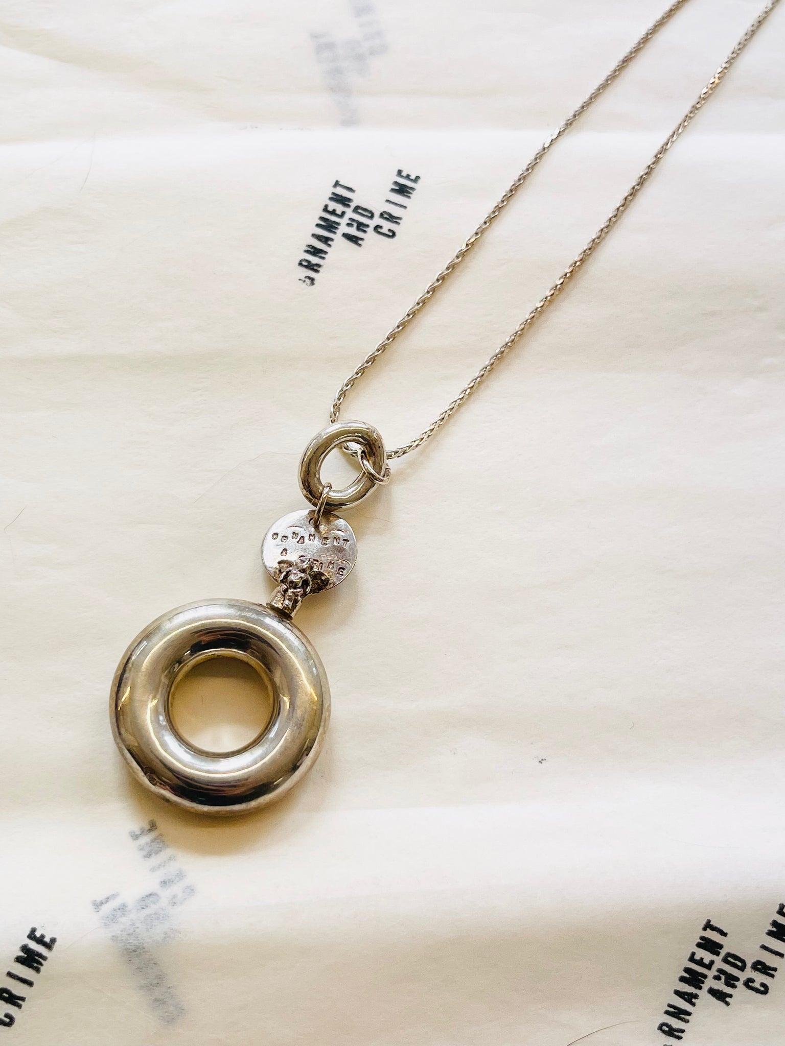Perfume holder "O" with Angel necklace