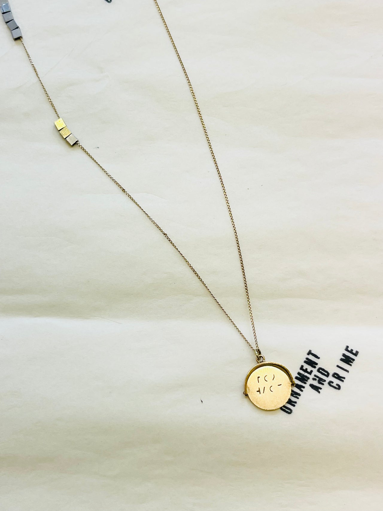 ORNAMENT & CRIME 'GABRIEL' SPINNING CHARM NECKLACE oc19