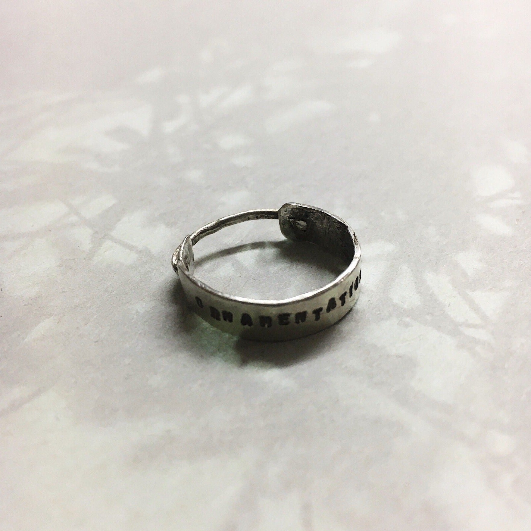 The irony ring  'Remove Ornamentation' Ring