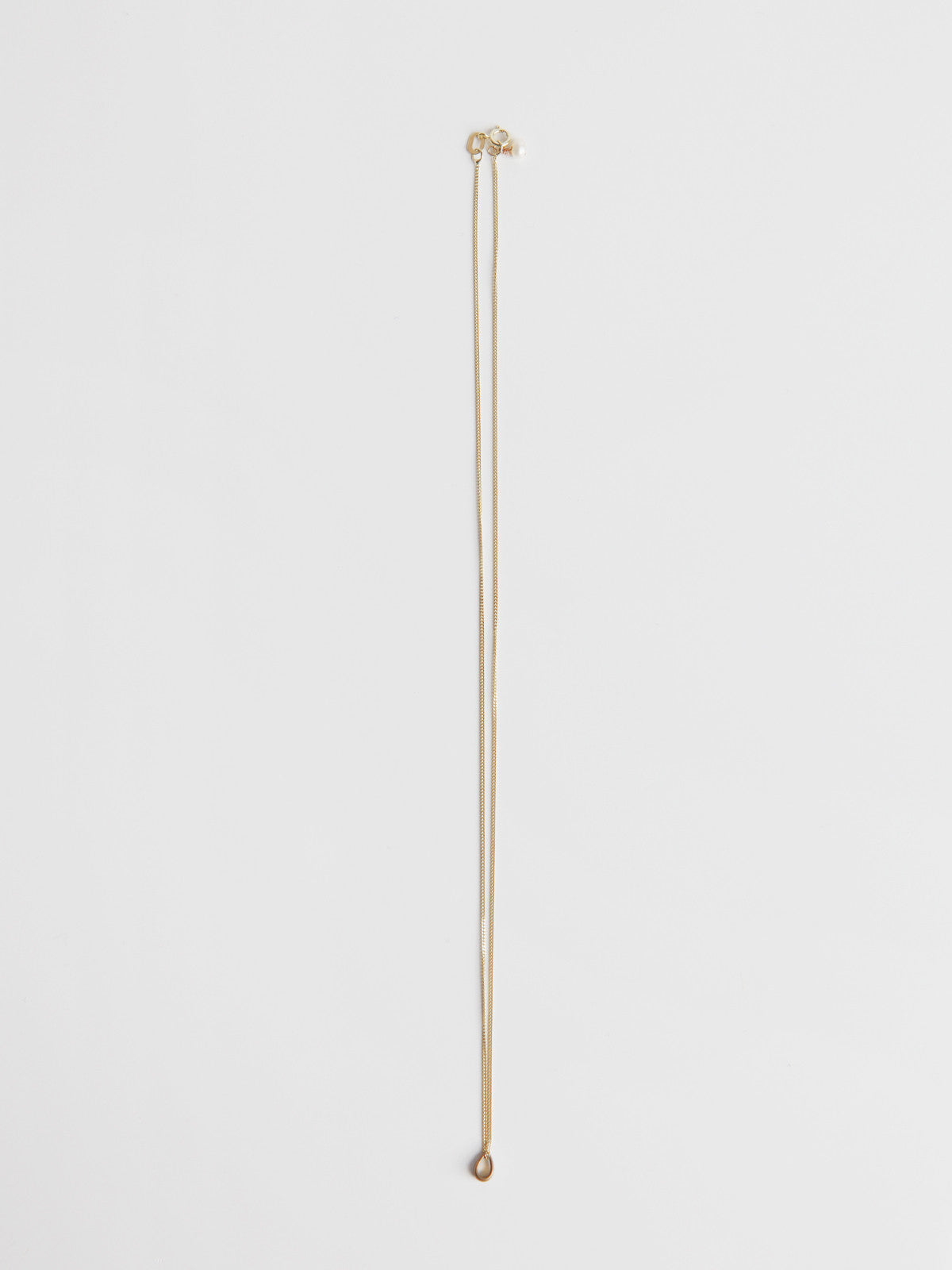 ORNAMENT & CRIME SMALL GOLDEN DROP NECKLACE