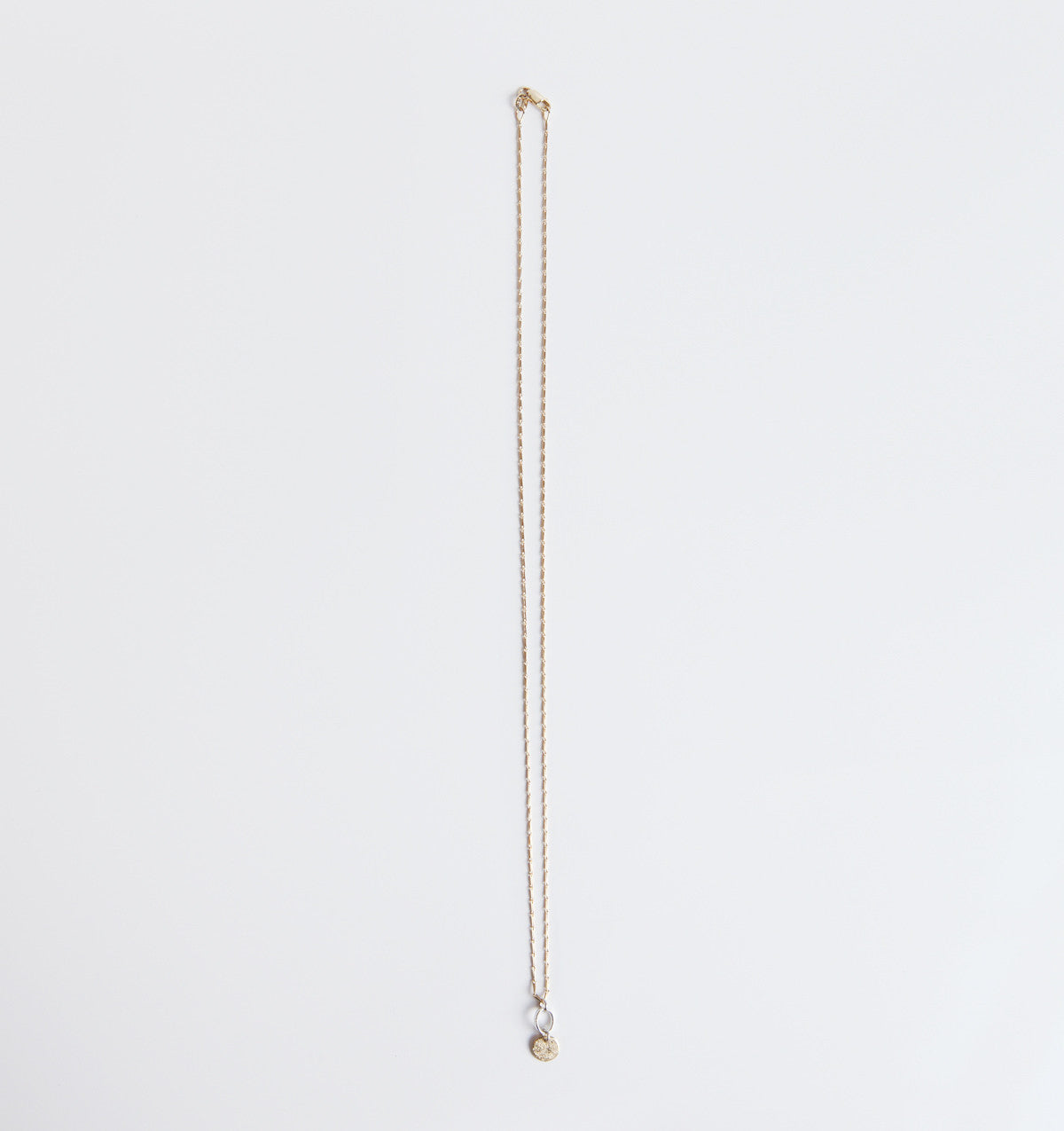 ORNAMENT & CRIME ROUND GOLD NECKLACE