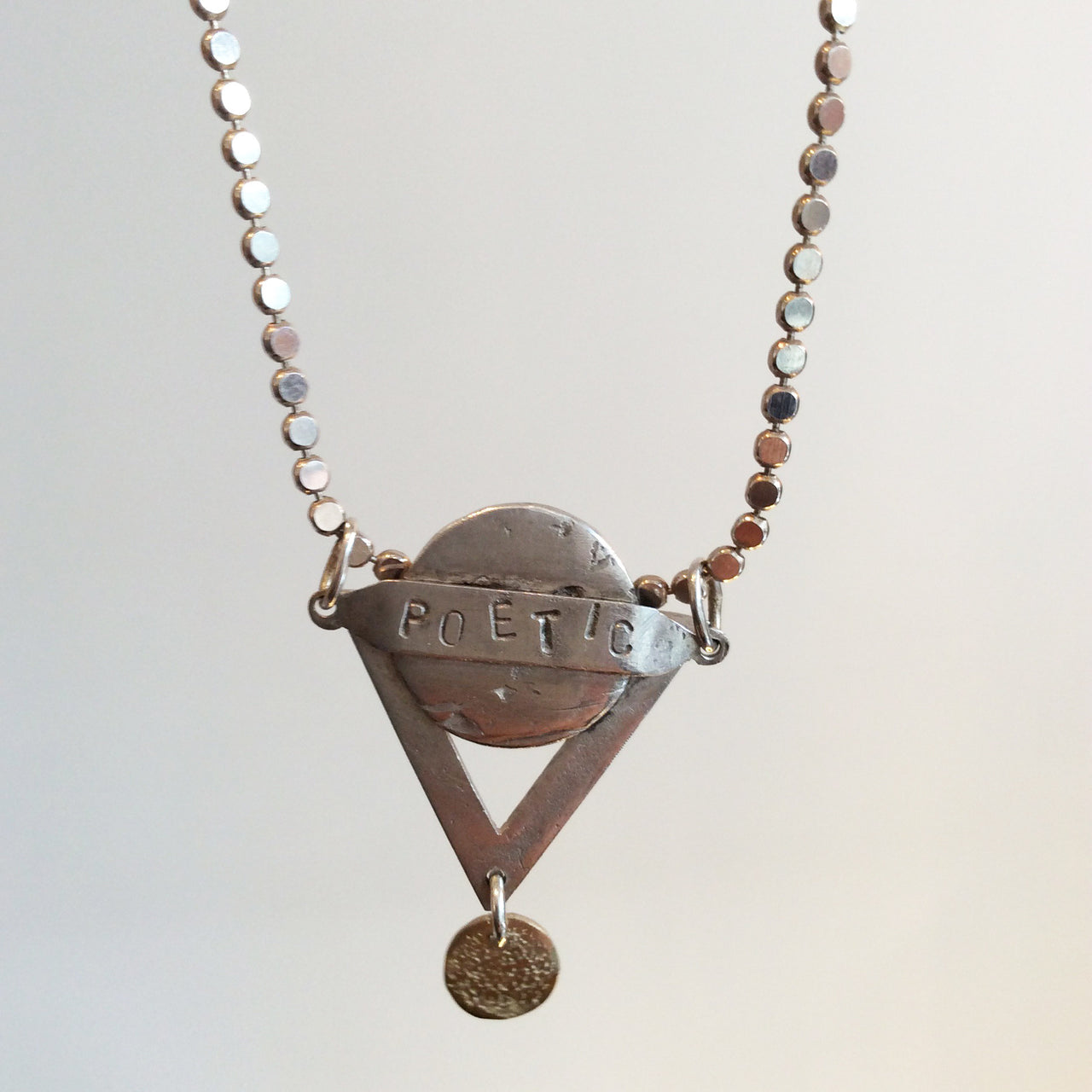 ORNAMENT & CRIME TRIANGLE 'POETIC' NECKLACE