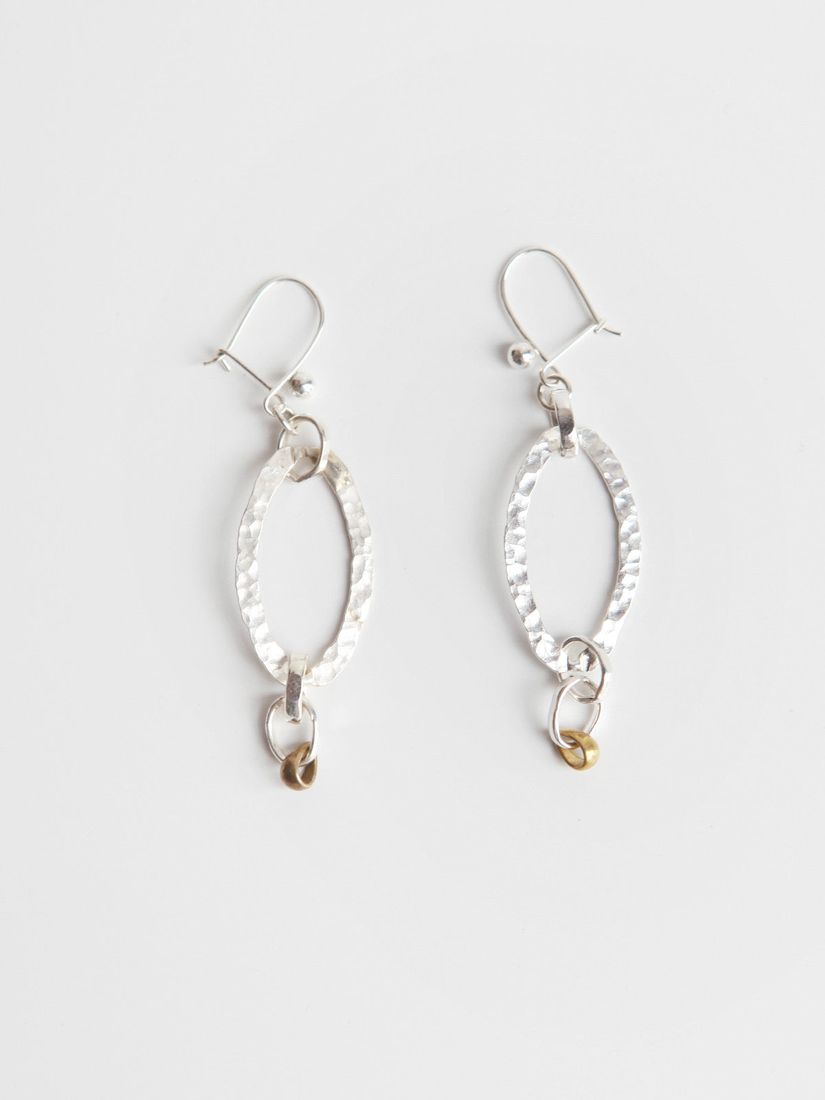 ORNAMENT & CRIME SILVER HAMMERED O EARRINGS
