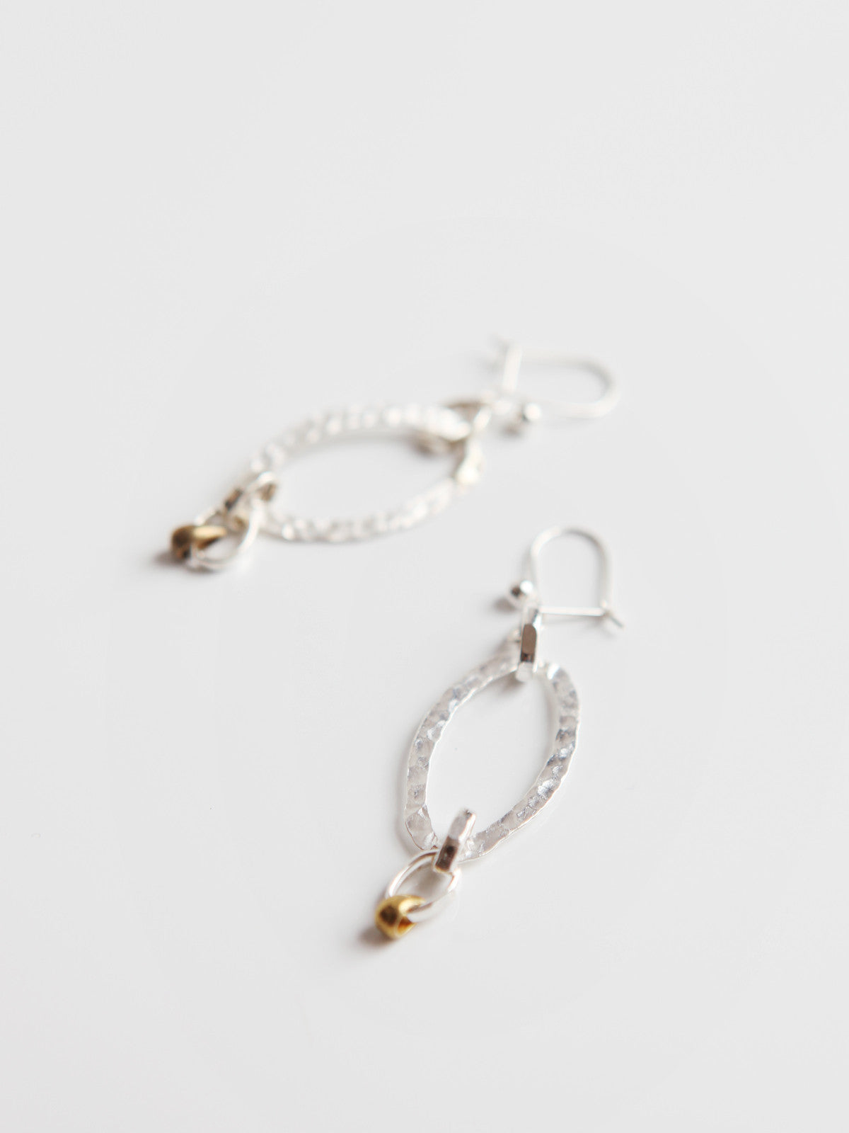ORNAMENT & CRIME SILVER HAMMERED O EARRINGS