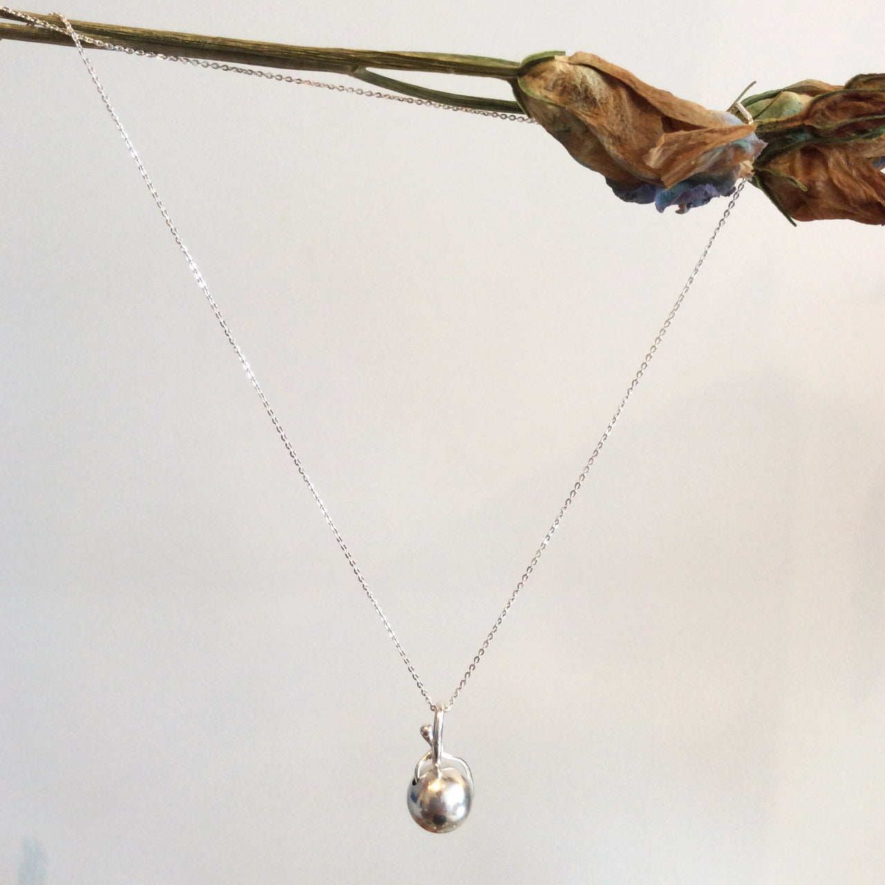 ORNAMENT & CRIME BALL NECKLACE