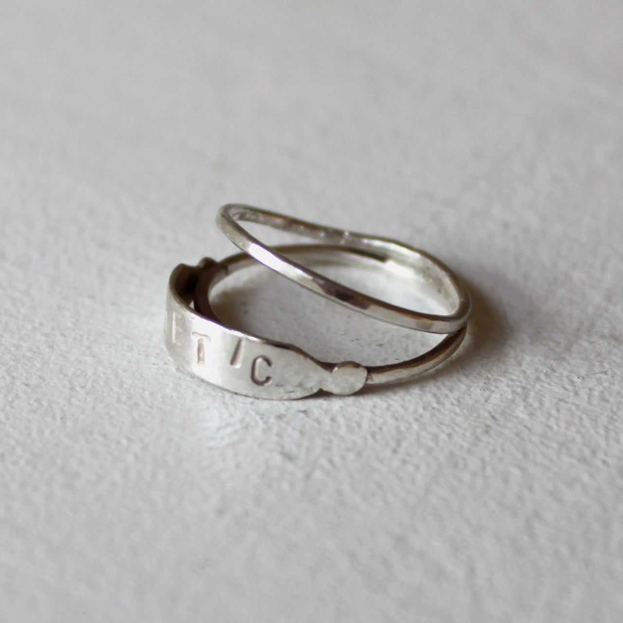 ORNAMENT & CRIME 'BEAU' DOUBLE BAND RING WITH 'POETIC' ENGRAVED